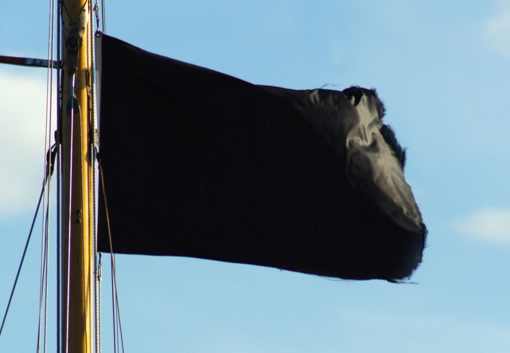 Pirate ship flag of the Skull and Crossbones.