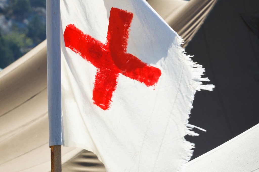 Red cross flag at refugee camp