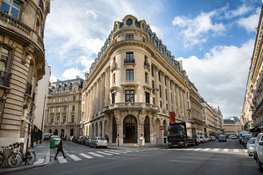 © PARIS, FRANCE - March 2, 2015: Typical acrhitecture of the famous Rue La Fayette in central Paris on an early spring day. March 2nd 2015 in Paris